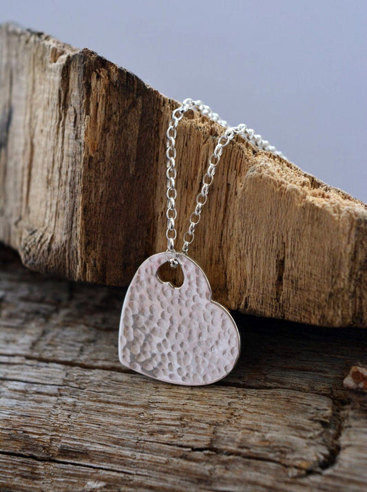 Hammered sterling silver heart necklace pendant.