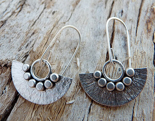 Sterling silver dangle fan earrings.