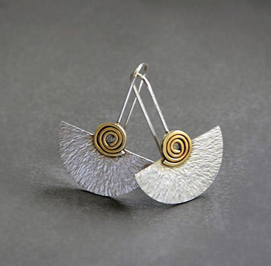 Sterling silver and 24k gold plated fan earrings.