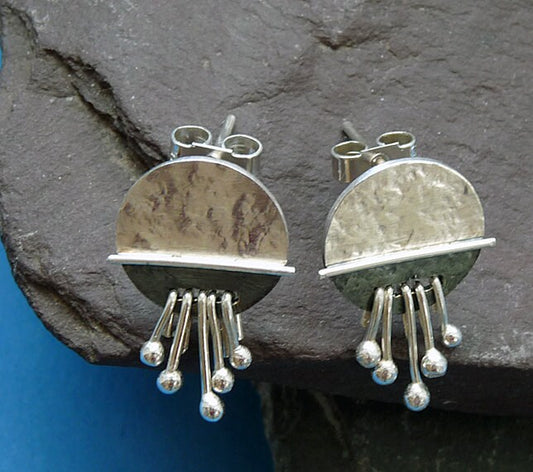 Dangle sterling silver disc stud earrings.