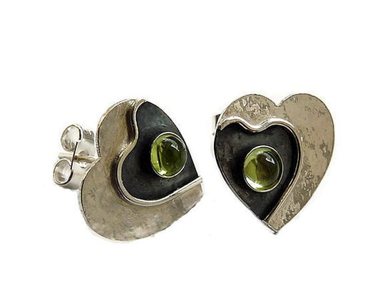 Peridot sterling silver heart stud earrings.