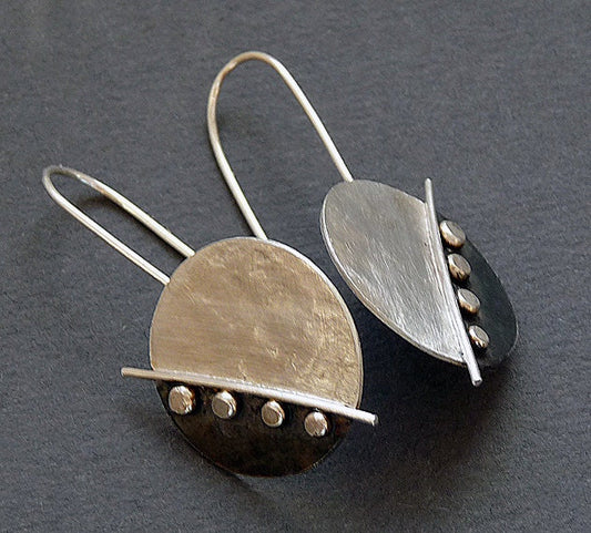 Large sterling silver disc earrings.